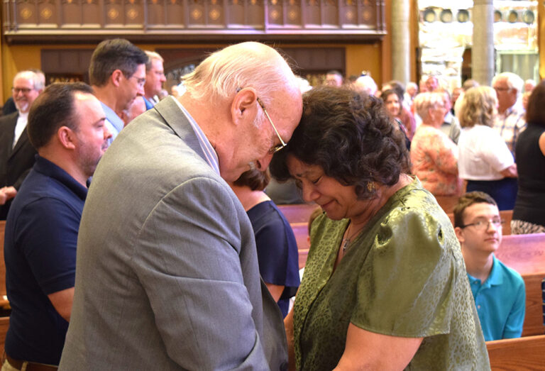 The moment when the wedding promises are renewed can be very emotional, bringing home to couples how far the years have brought them together. Penelope and Dave Devall of Holy Cross Parish in Champaign, marking their golden anniversary in 2023, were among nearly 100 couples renewing their vows at the 25th and 50th Anniversary Mass at St. Mary’s Cathedral in Peoria on Sept. 10. (The Catholic Post/Paul Thomas Moore)